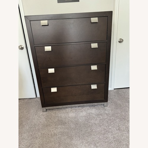 Used Raymour & Flanigan Dark Brown Wood Dresser for sale on AptDeco