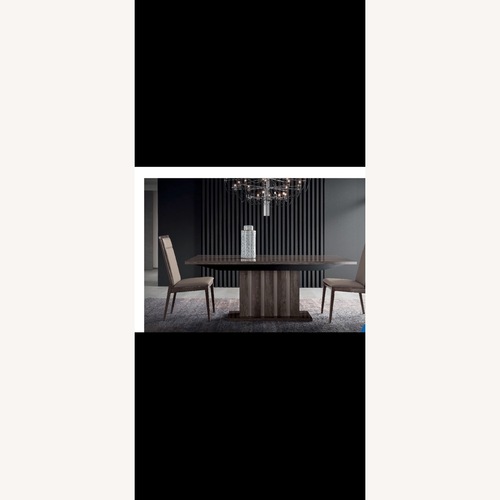 Used Modern Extendable Dining Table with Pedestal Base  for sale on AptDeco