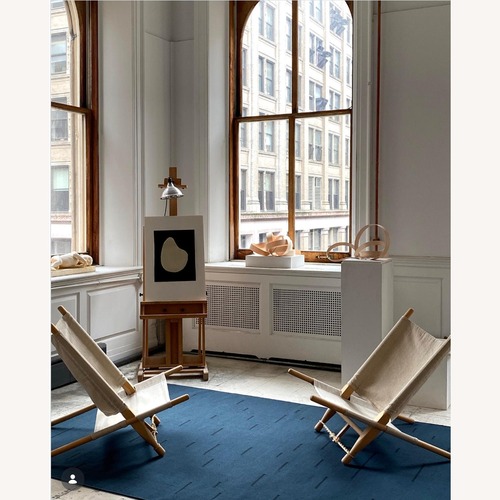 Used Nordic Knots Blue Wool Area Rug 5' x 8' for sale on AptDeco