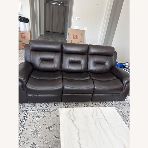 Used Dark Brown Leather 3+ Piece Sectional for sale on AptDeco
