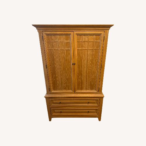 Used Thomasville Furniture Natural Wood Armoire for sale on AptDeco