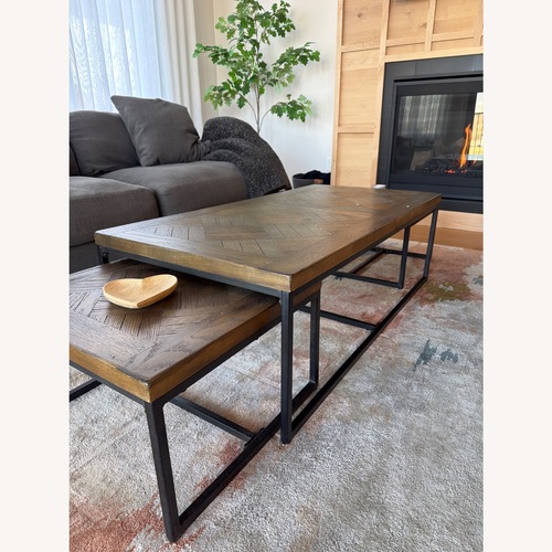 Used Dark Brown Wood Coffee Table Metal Base for sale on AptDeco