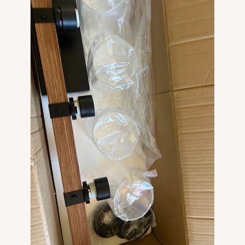 Used Dark Brown Wood Ceiling Lamp for sale on AptDeco