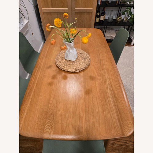 Used Casterly Oak Dining Table  for sale on AptDeco