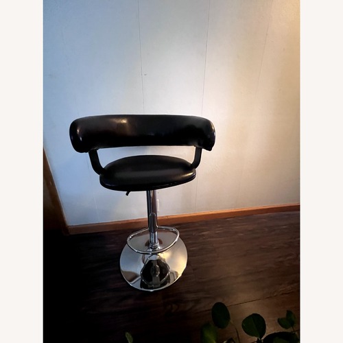 Used Black Leather Chair for sale on AptDeco