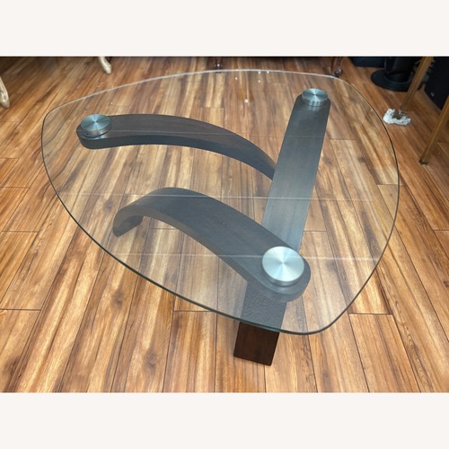 Used Raymour & Flanigan Allure Glass Coffee Table for sale on AptDeco