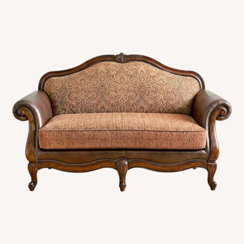 Used Raymour & Flanigan Loveseat With Leather Armrest  for sale on AptDeco