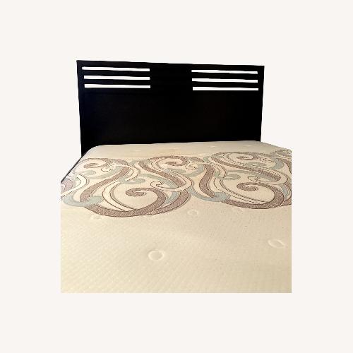 Used Macy's Black Wood Queen Bed for sale on AptDeco