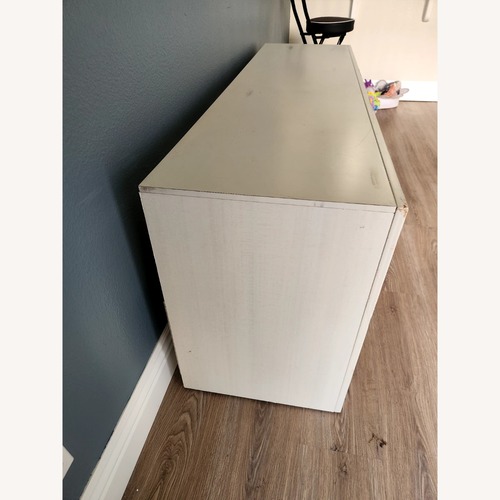 Used Living Spaces White Wood Media Storage for sale on AptDeco