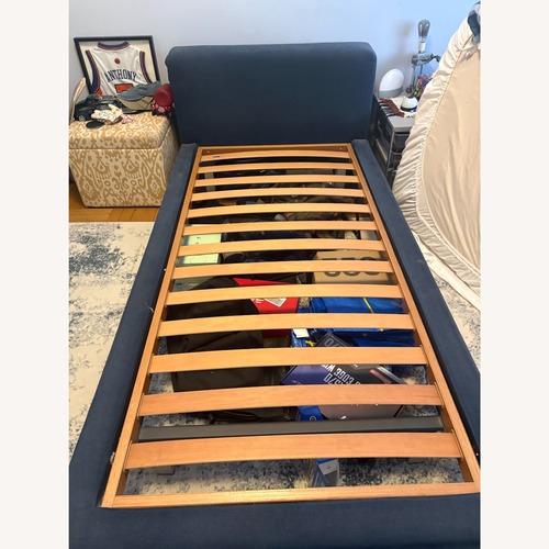 Used Pair of Poliform Navy Twin Beds for sale on AptDeco