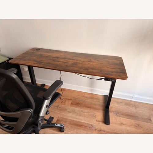 Used Veken Dark Brown Electric Standing Desk for sale on AptDeco