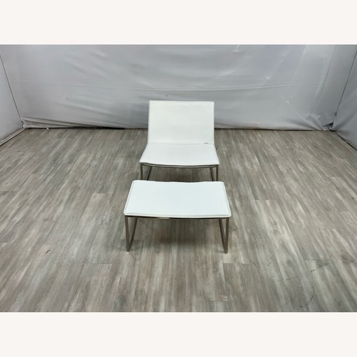Used CB2 Triumph Lounge Chair & Ottoman for sale on AptDeco