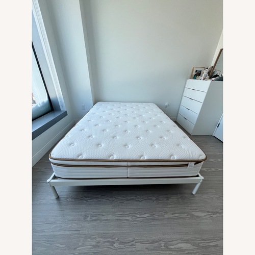 Used IKEA Vevelstad White Metal Queen Bed for sale on AptDeco