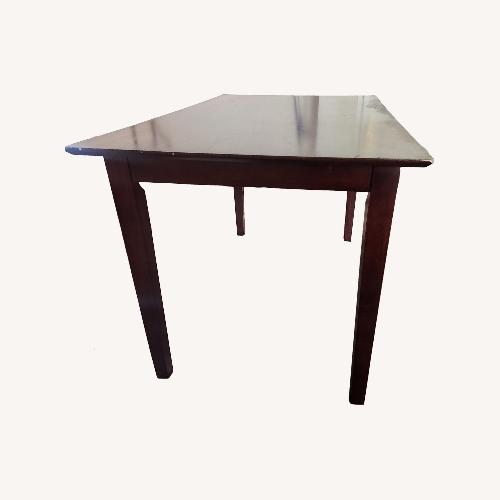 Used Ashley Furniture Dark Brown Wood Dining Sets for sale on AptDeco