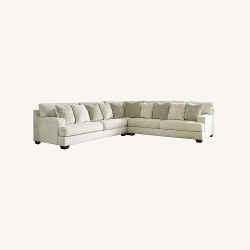Used Ashley Furniture Rawcliffe Parchment Modular Sectional for sale on AptDeco