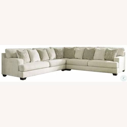 Used Ashley Furniture Rawcliffe Parchment Modular Sectional for sale on AptDeco