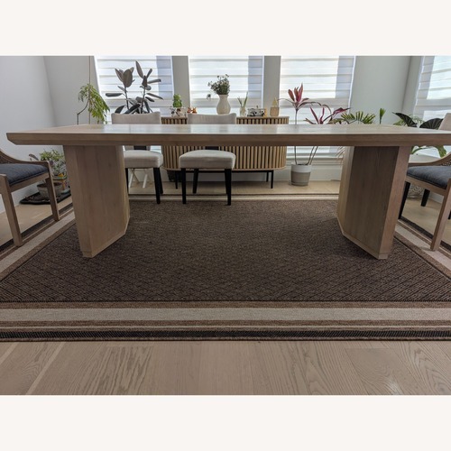 Used Living Spaces Natural Wood Dining Table for sale on AptDeco