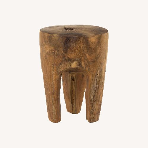 Used Primitive Indonesian Three-Leg Wood Stool for sale on AptDeco