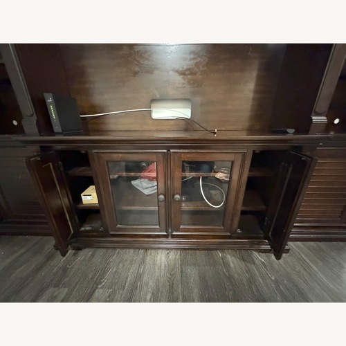 Used Brown Wooded Entertainment Center for sale on AptDeco