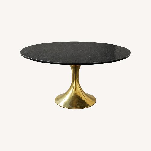 Used Dakota Black Marble Top Round Dining Table for sale on AptDeco