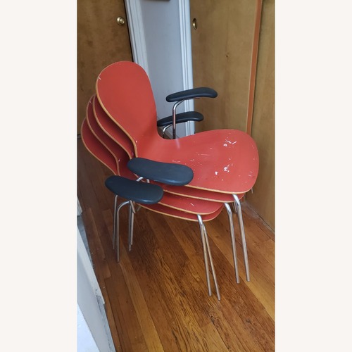 Used Knoll Sprite 2004 Orange Dining Chairs for sale on AptDeco
