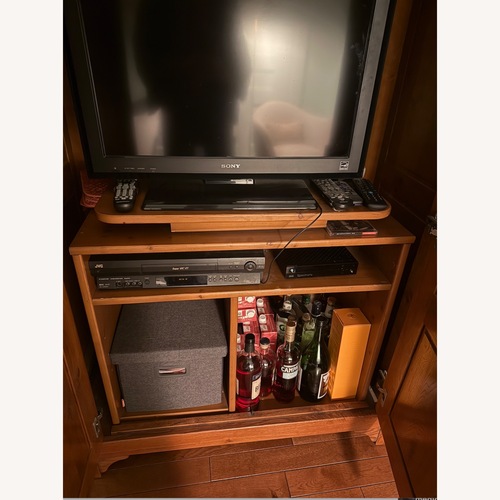 Used Oak Armoire for sale on AptDeco