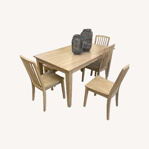 Used Ashley Furniture Natural Wood Dining Set for sale on AptDeco