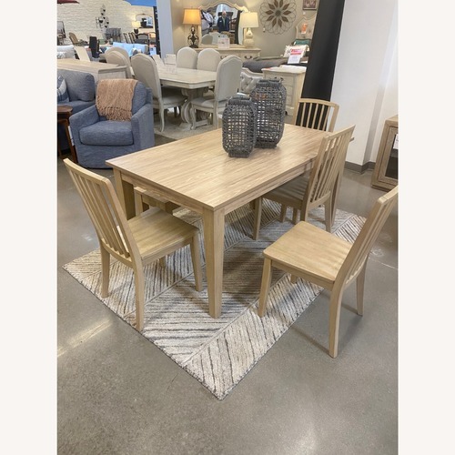 Used Ashley Furniture Natural Wood Dining Set for sale on AptDeco