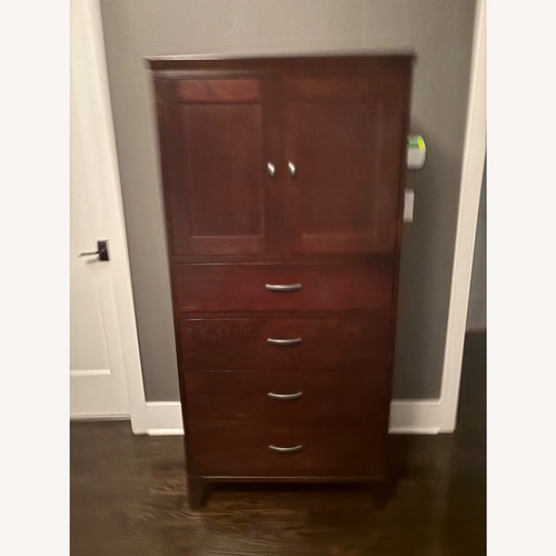 Used Ethan Allen Horizons Dark Brown Wood Armoire for sale on AptDeco