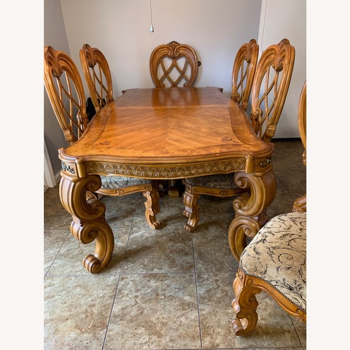 Used Elegant Carved Formal Dining Table Set – 6 Chairs for sale on AptDeco
