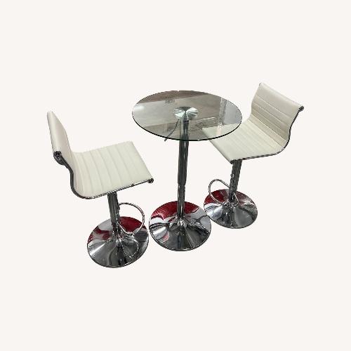 Used Glass Cocktail Table and Chairs for sale on AptDeco