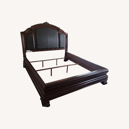 Used Dark Brown Wood King Bed for sale on AptDeco