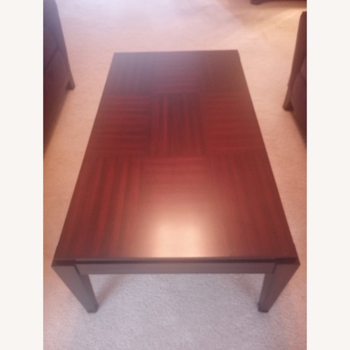 Used Rooms To Go  Wood Cassara Coffee Table Set for sale on AptDeco