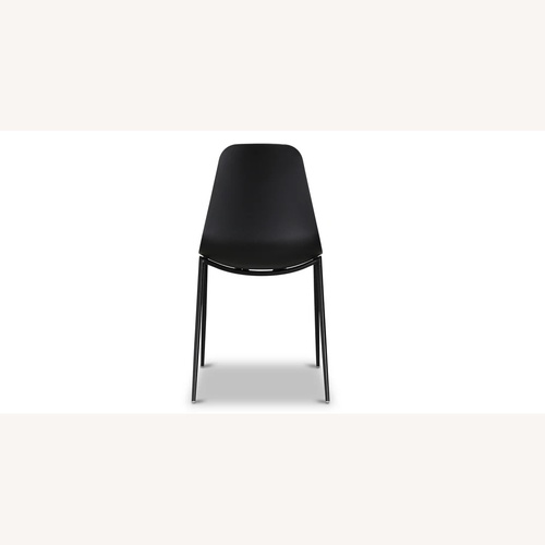 Used Poly and Bark Black Isla Dining Chairs (Set of 4) for sale on AptDeco