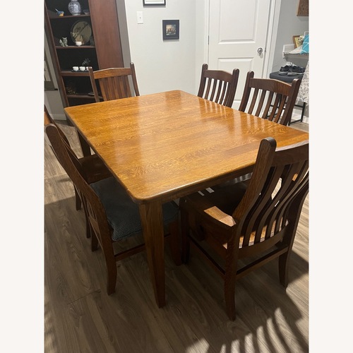 Used Simply Amish Dark Brown Wood Dining Table for sale on AptDeco