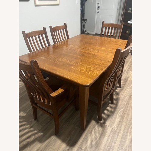 Used Simply Amish Dark Brown Wood Dining Table for sale on AptDeco