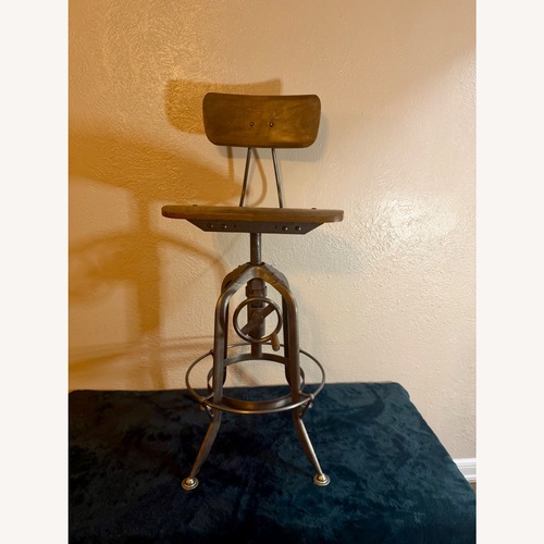Used Pottery Barn Dark Brown Metal Dining Chair for sale on AptDeco