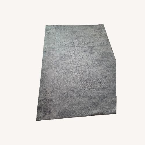 Used Machine Washable, Soft, Gray Area Rug 5' x 7' for sale on AptDeco
