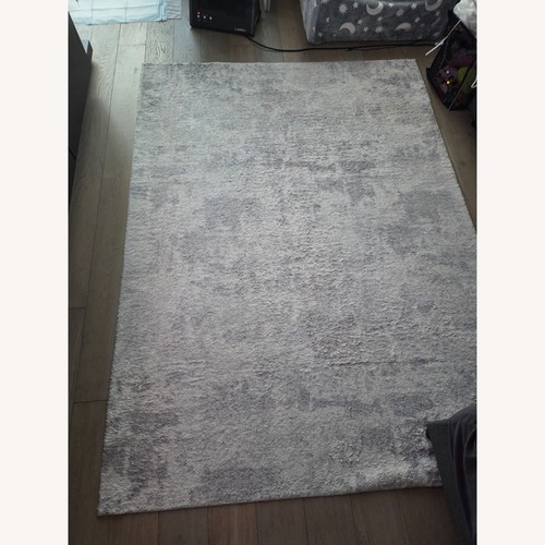 Used Machine Washable, Soft, Gray Area Rug 5' x 7' for sale on AptDeco