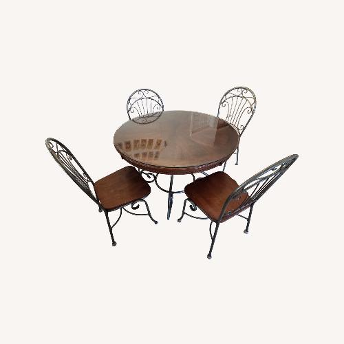 Used Dark Brown Wood Dining Set for sale on AptDeco