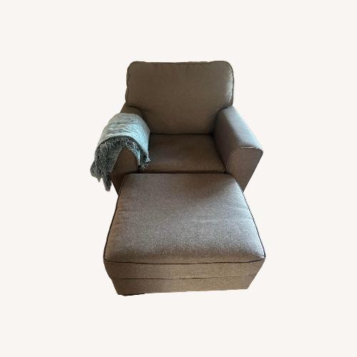 Used Ashley Furniture Dark Brown Armchair and Ottoman for sale on AptDeco