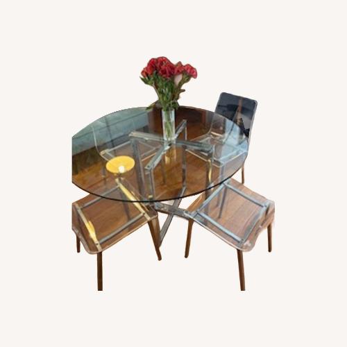 Used 47” Round Glass Table with Lucite Chairs  for sale on AptDeco