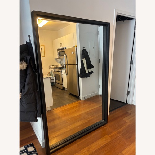 Used Domain Furniture Black Wood Floor Mirror for sale on AptDeco