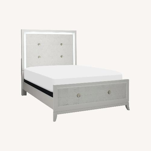 Used Raymour & Flanigan Giovanna White Wood Queen Bed for sale on AptDeco