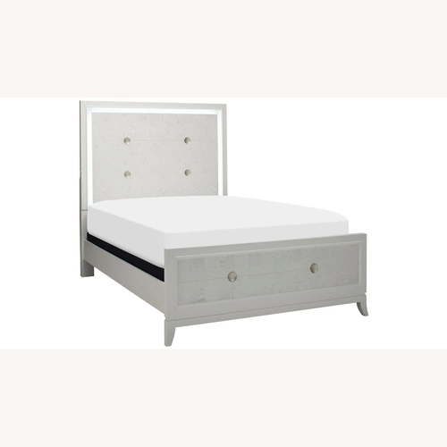 Used Raymour & Flanigan Giovanna White Wood Queen Bed for sale on AptDeco