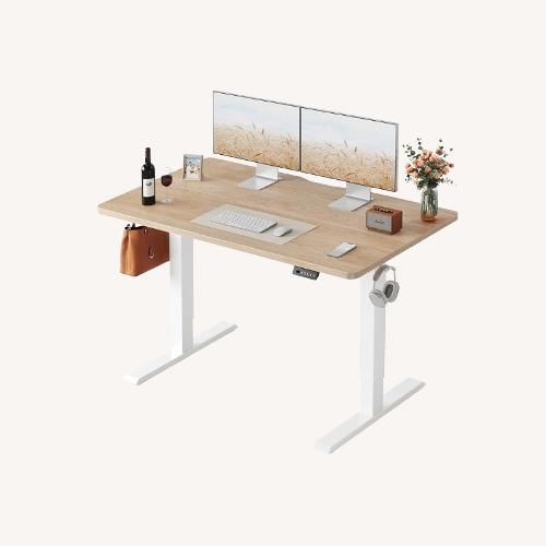 Used Amazon Light Brown Wood Desk for sale on AptDeco