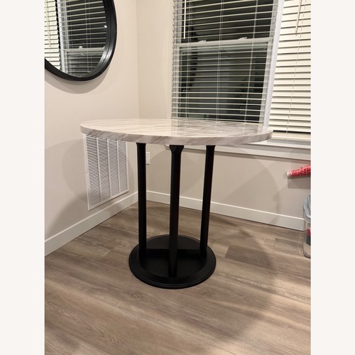 Used Ashley Furniture Centiar Bar Table for sale on AptDeco