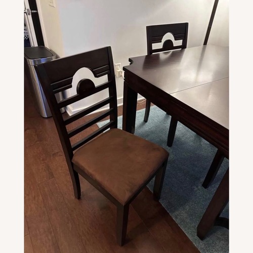 Used Solid Wood Dining Table & 6 Chairs for sale on AptDeco