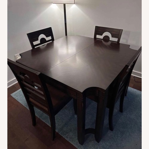 Used Solid Wood Dining Table & 6 Chairs for sale on AptDeco