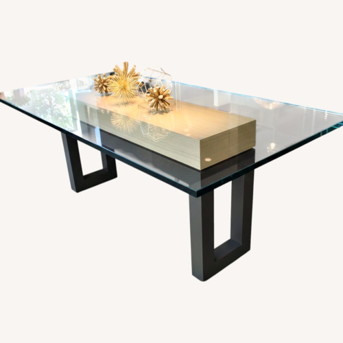 Used Natural Glass Dining Table for sale on AptDeco